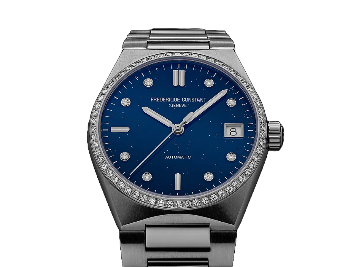 Luxury blue dial stainless steel watch on dark background.