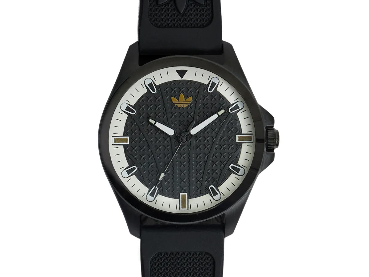 Casual black dial men’s watch on dark background.