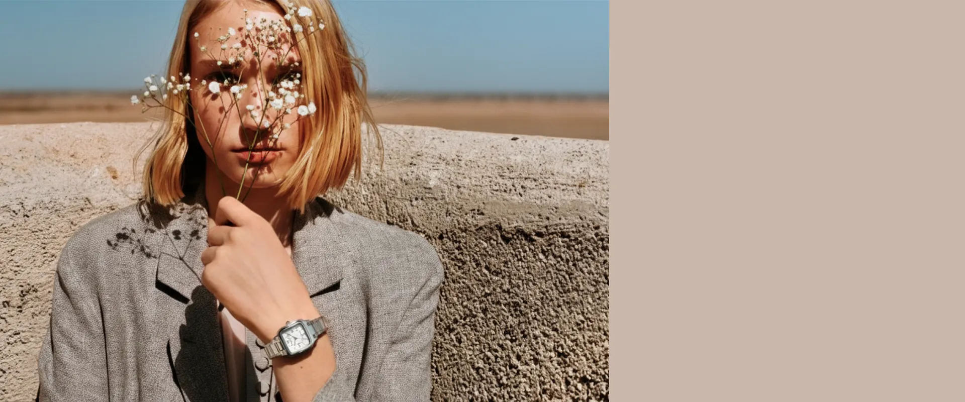 Woman wearing an elegant silver watch &ndash; Women's Day gift inspiration