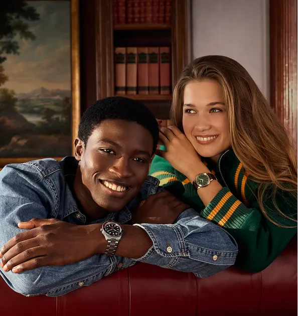 Couple wearing modern unisex wrist watches