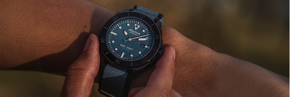 Professional dive watch with blue dial and rotating bezel