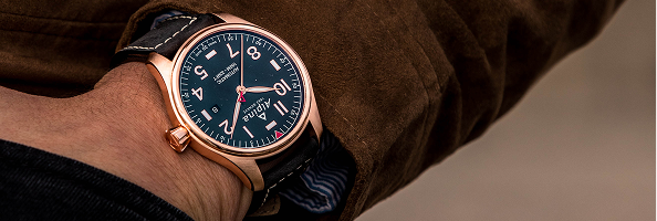 Classic pilot watch with blue dial and leather strap