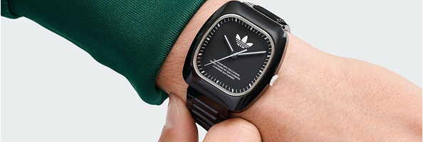 Modern sport watch with black case and rubber strap